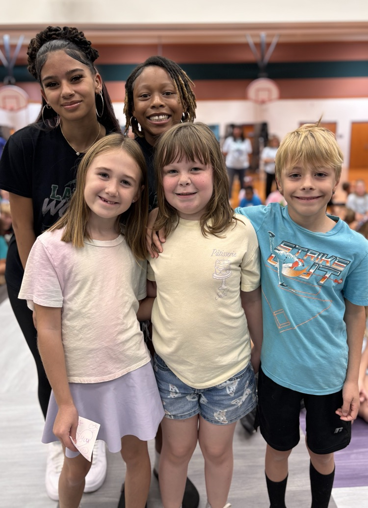 students with basketball players