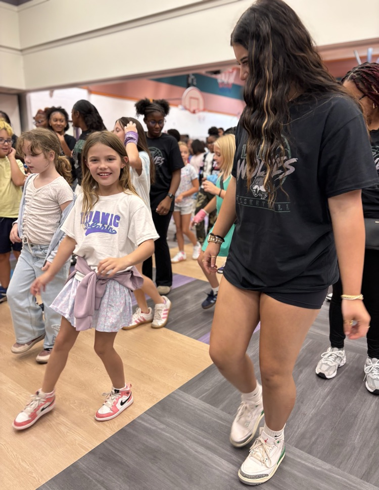 student and basketball player dancing 