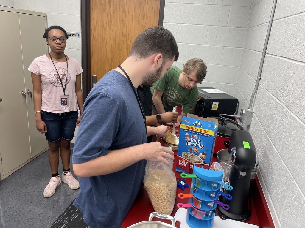 Interns working on making Rice Krispie treats