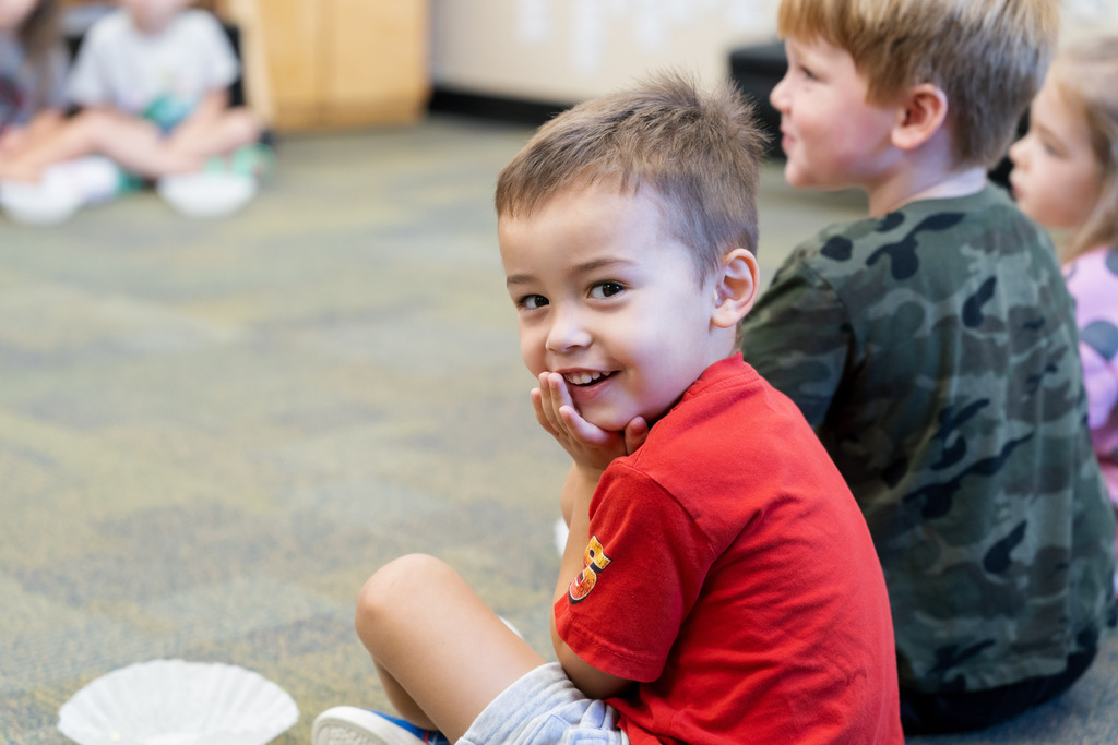 boy looking at camera and laughing