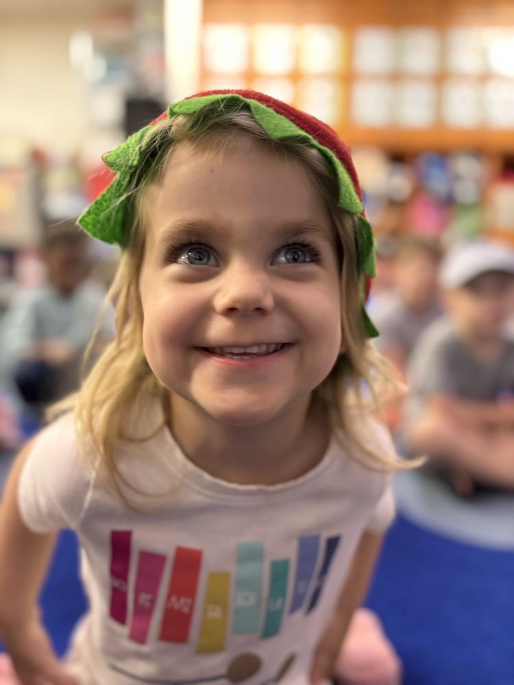 pre-K kid in her hat 