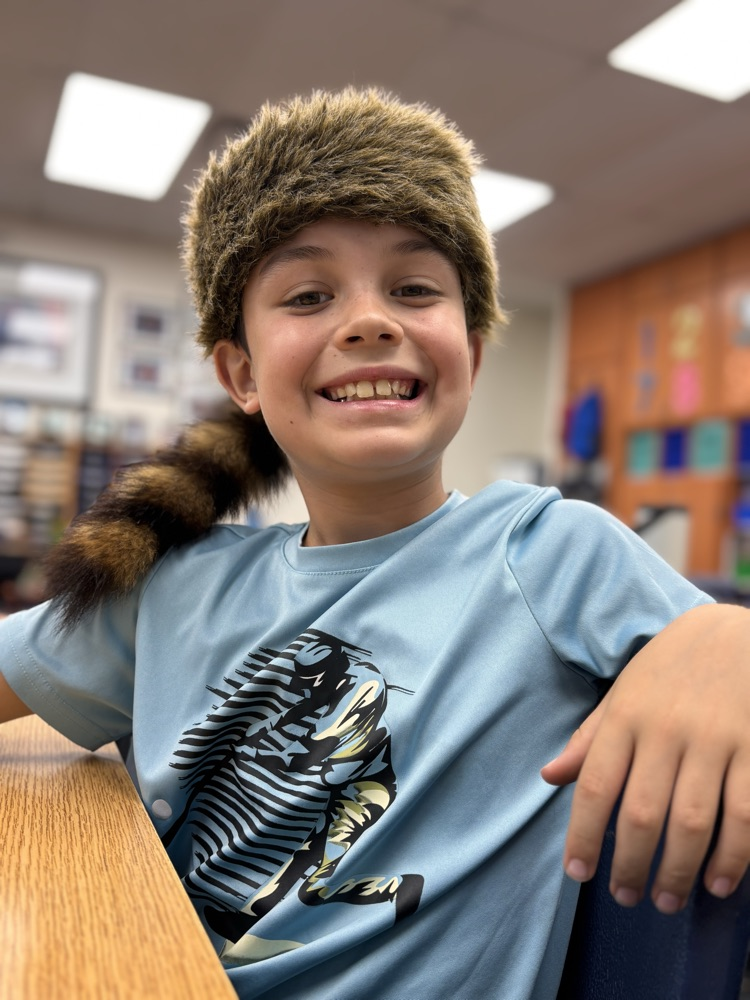 third grader with his hat 