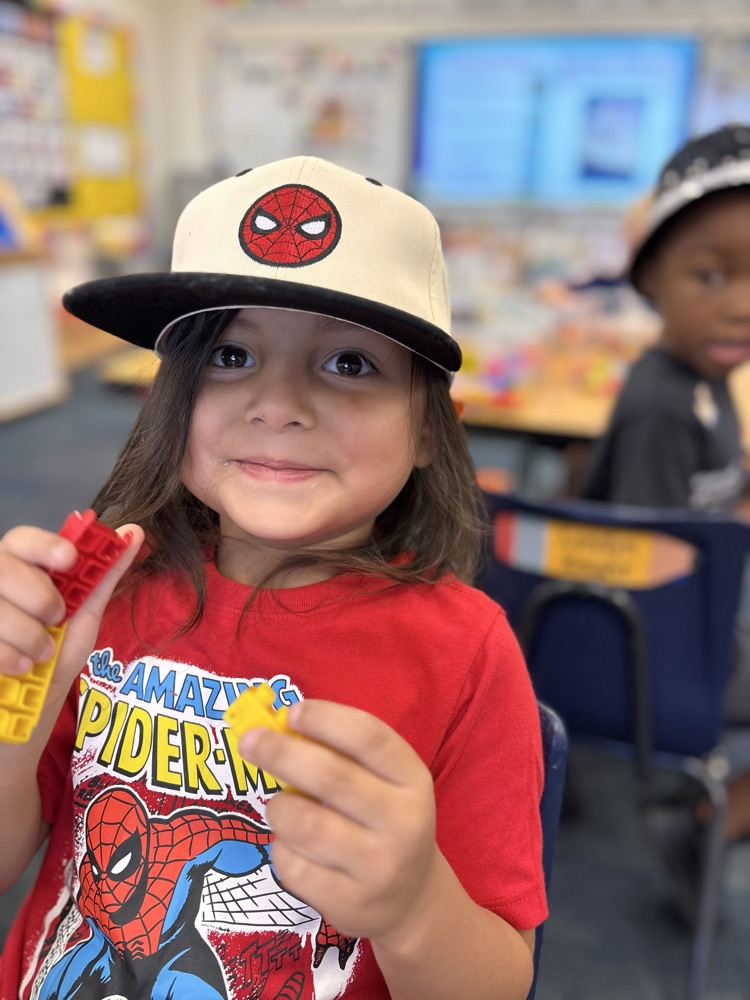 kindergartners with his hat 