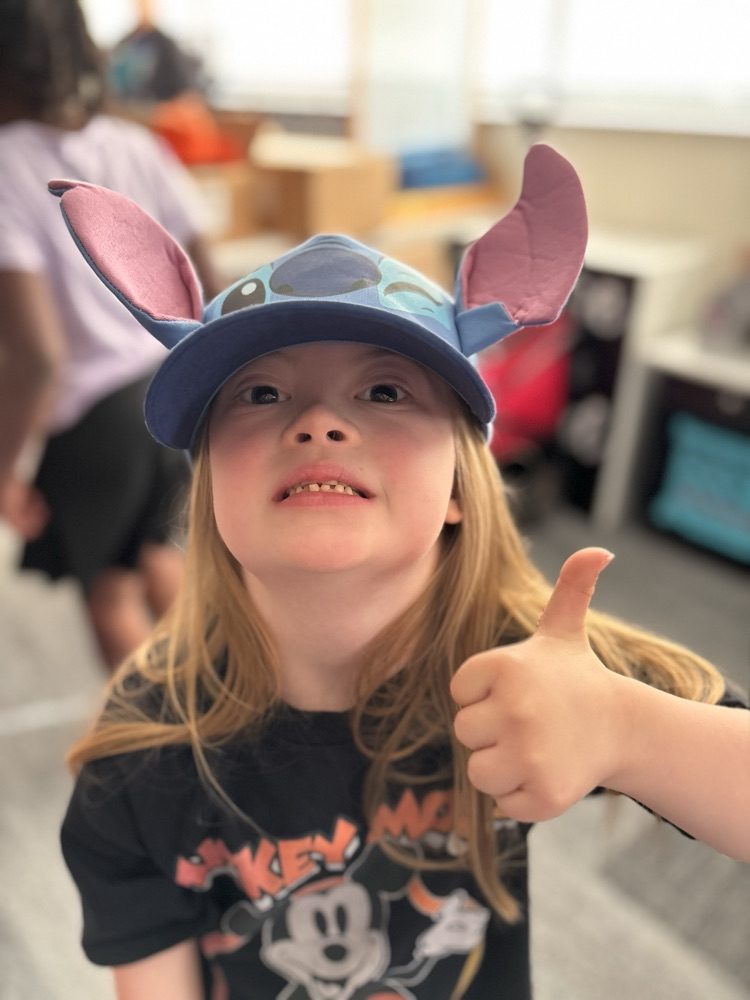 first grader in her hat 