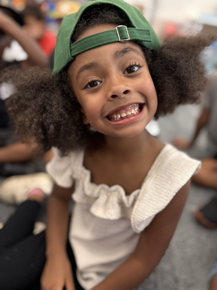 first grader in her hat 