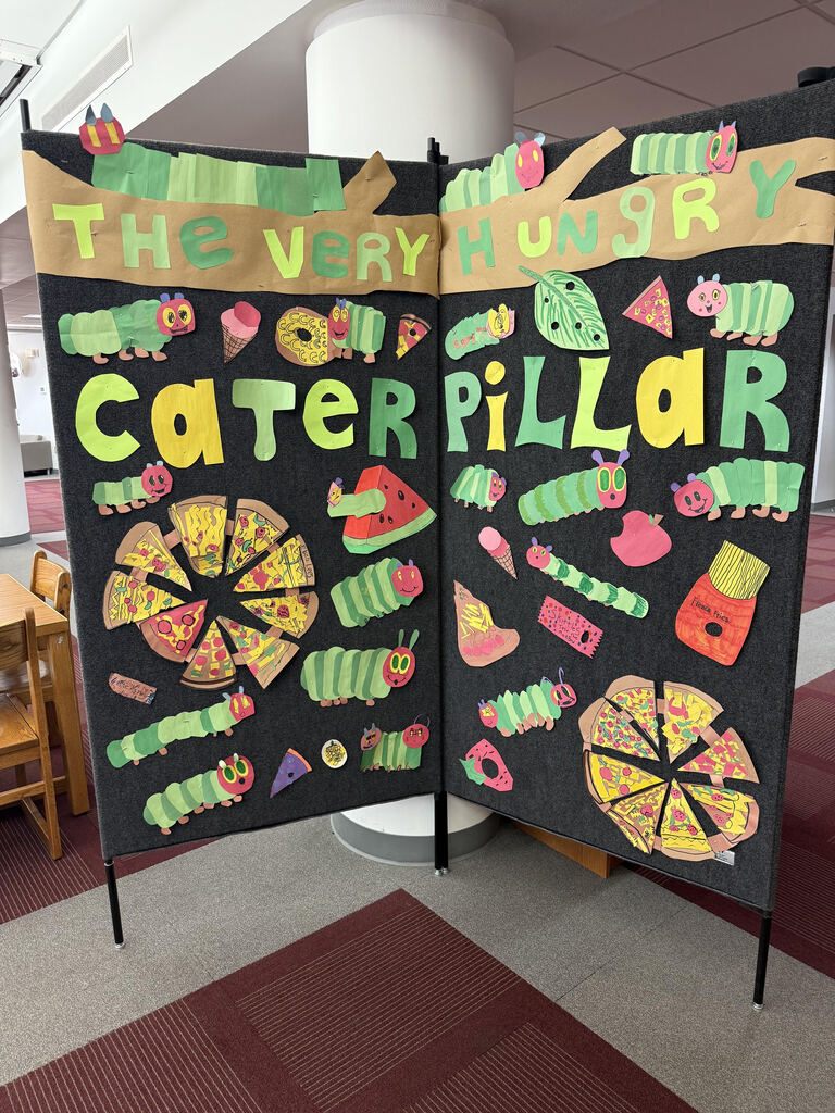 The very hungry caterpillar art display from our MAAS program/art students in the library