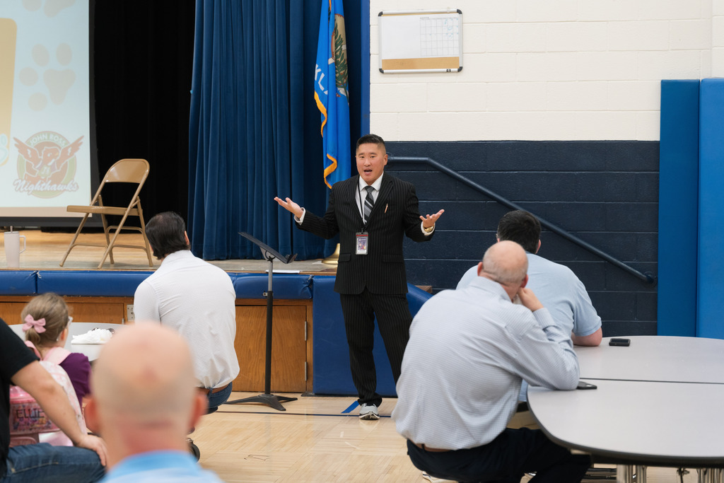 principal talking to dads