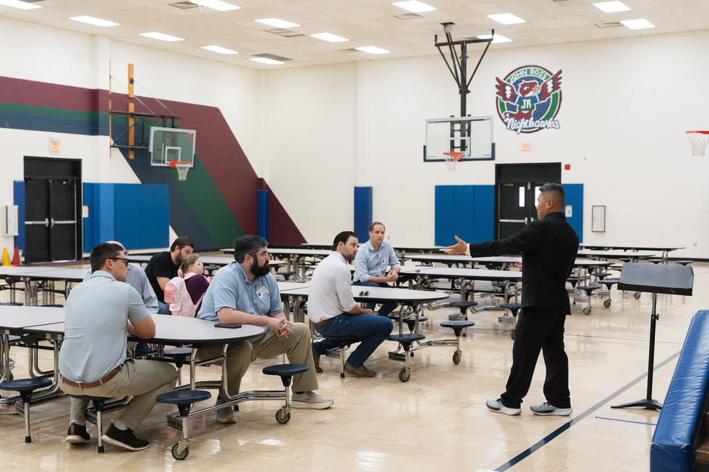 principal talking to dads