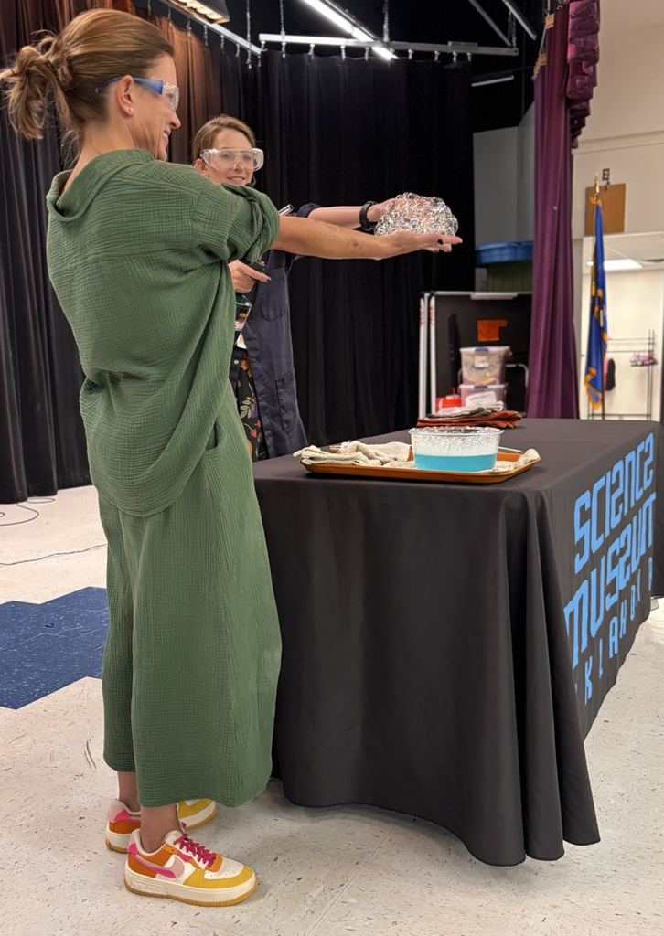 Mrs Payne with bubbles in hand 