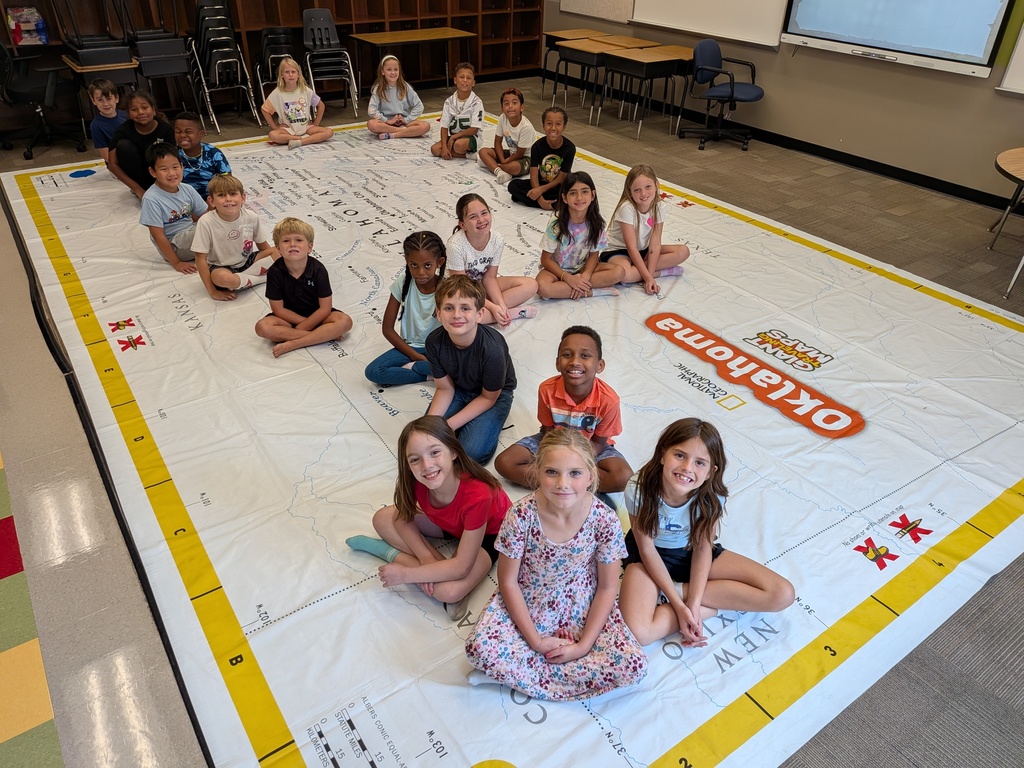 students learning about Oklahoma and super large floor map