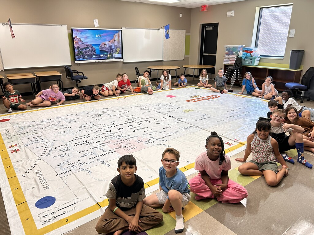 students learning about Oklahoma and super large floor map