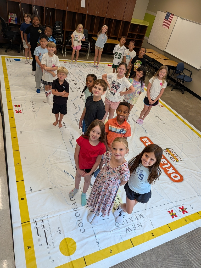 students learning about Oklahoma and super large floor map