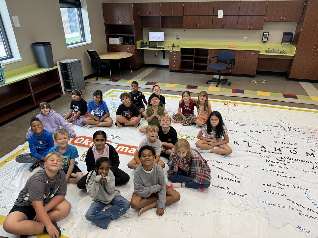 students learning about Oklahoma and super large floor map
