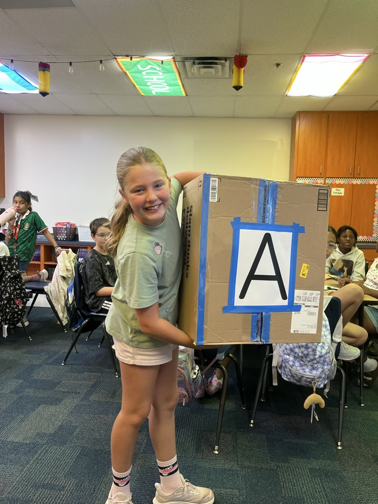 student with a box 