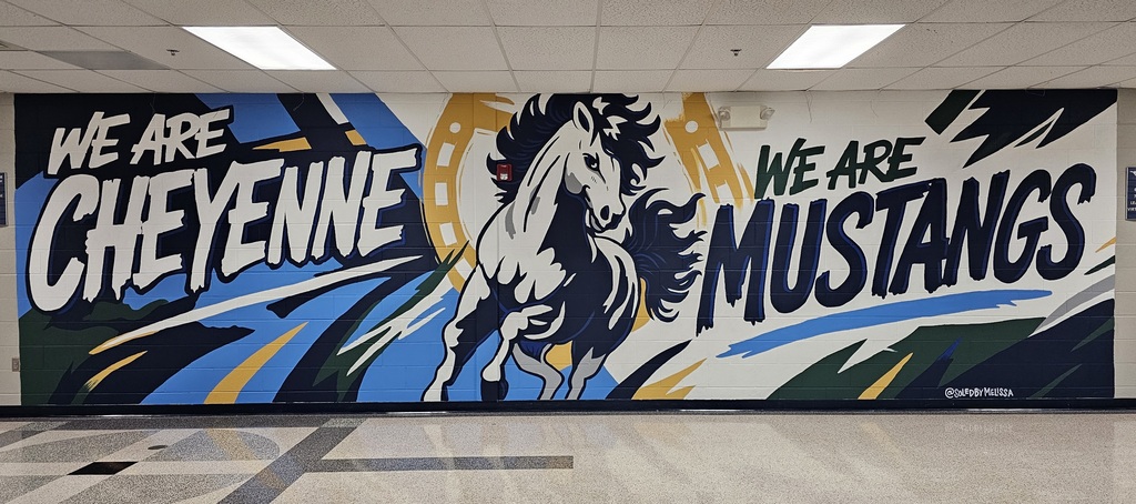 Mural with blue, navy, dark green, white, and gold abstract designs with a white and navy mustang and the words, "We are Cheyenne, We are Mustangs"