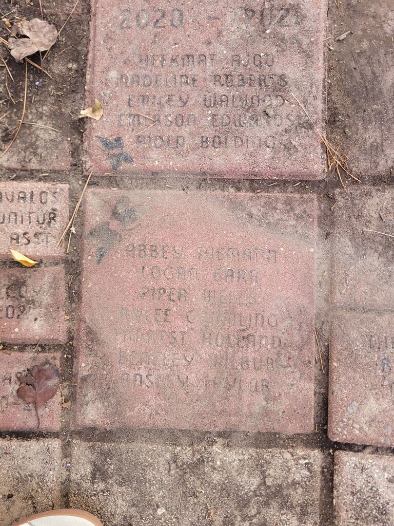 brick with student's name on it