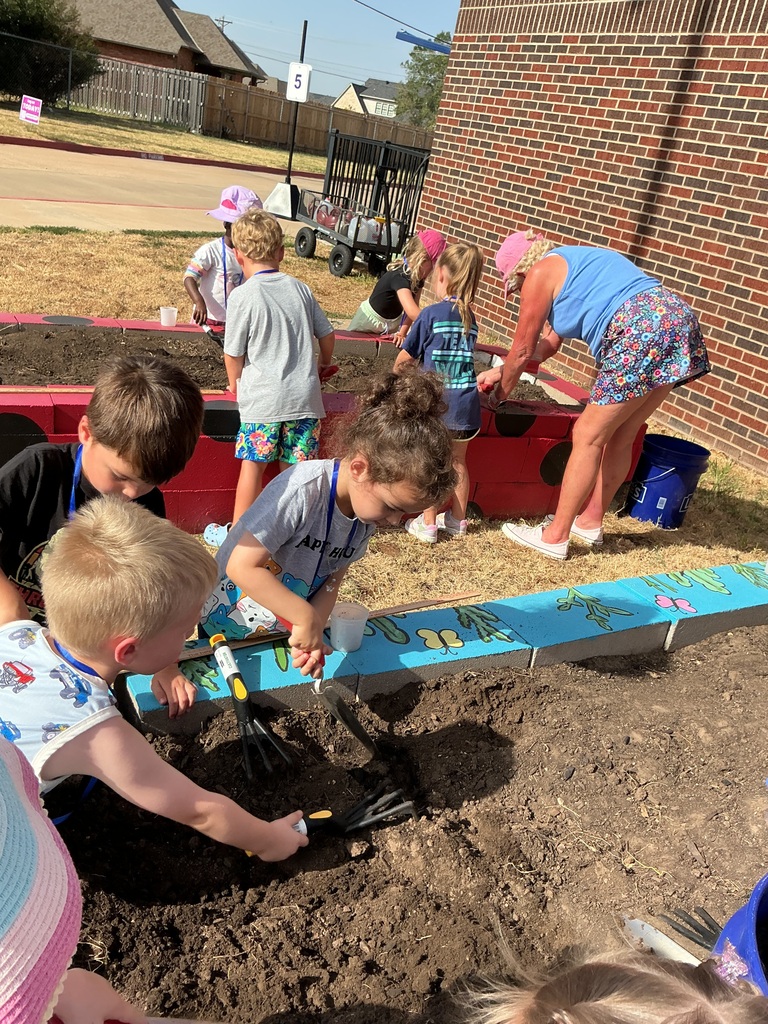 Students digging.