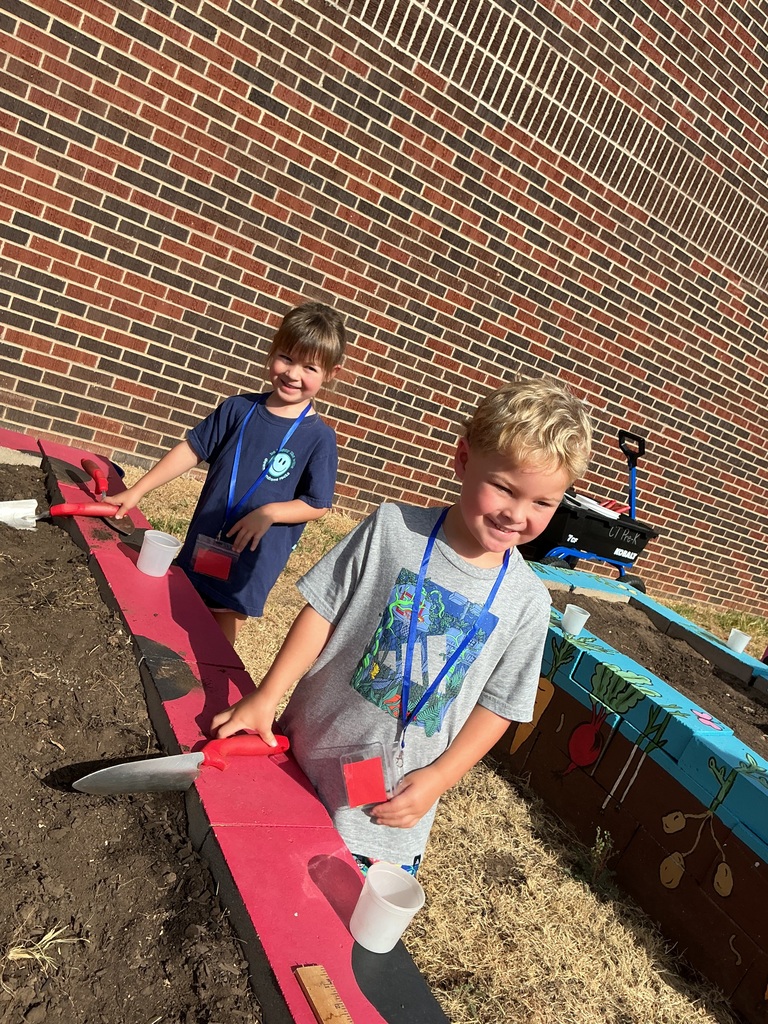Students digging.