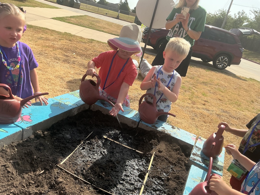 Students watering.