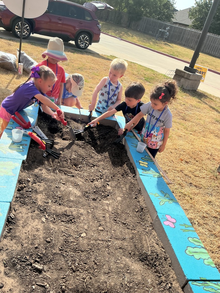 Students digging.