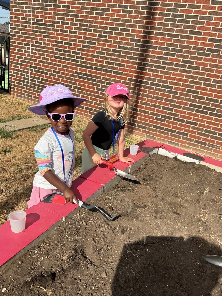 Students digging.