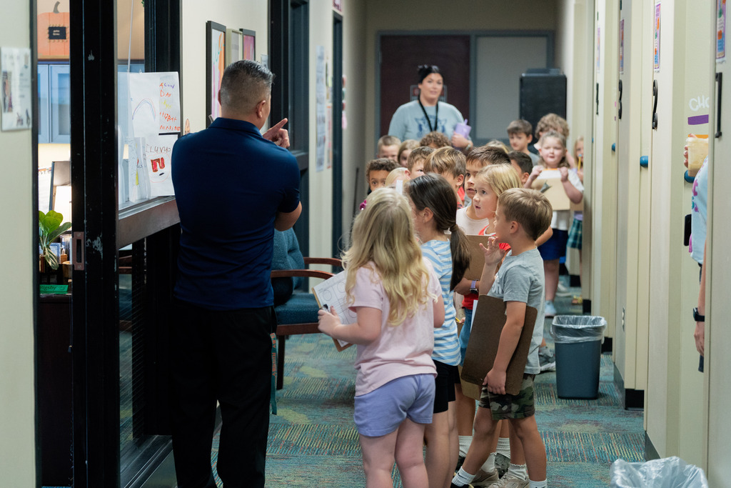 principal talking to students