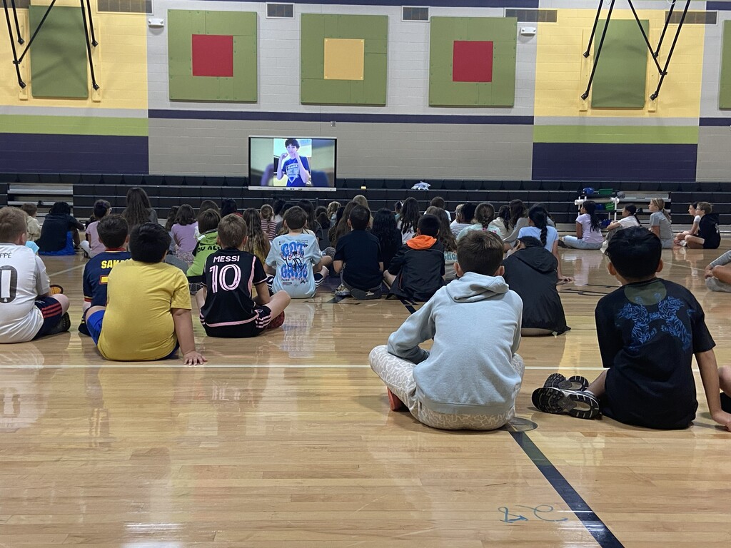 students watching video