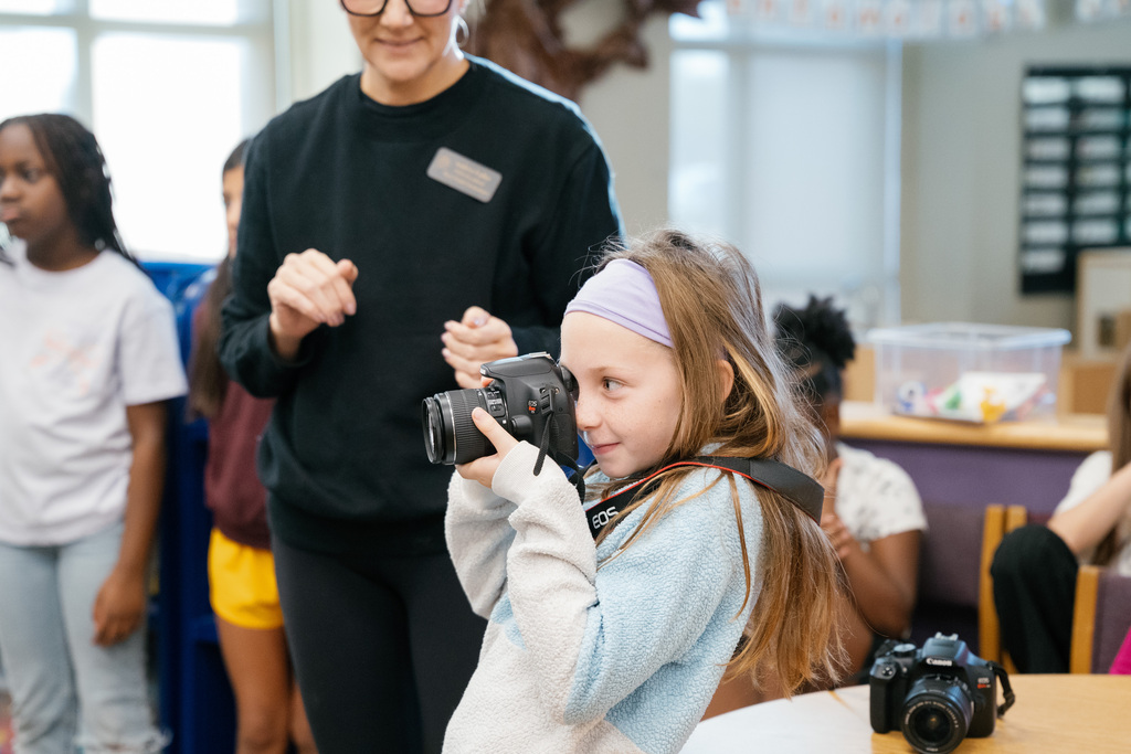 girl taking a photo