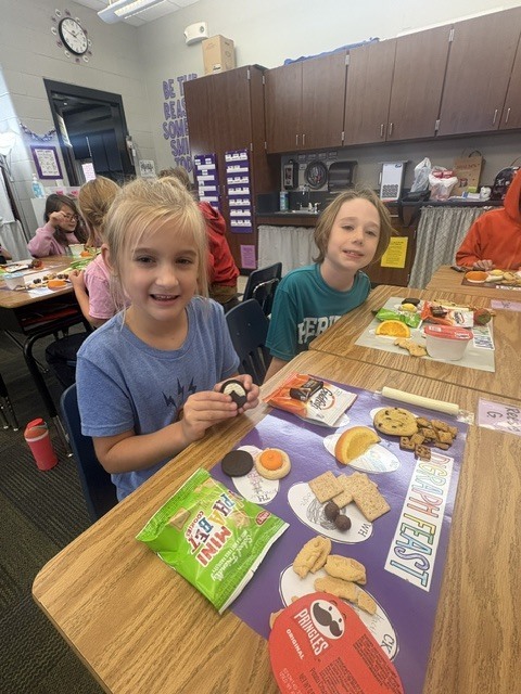 kids posing with digraph feast