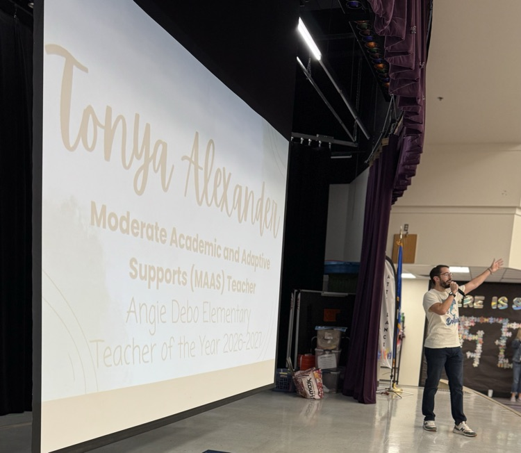 Mr Goodrich announcing teacher of the year 