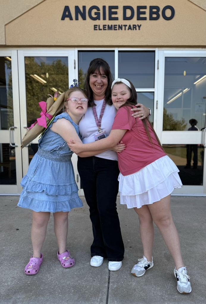 Mrs Alexander with former students 