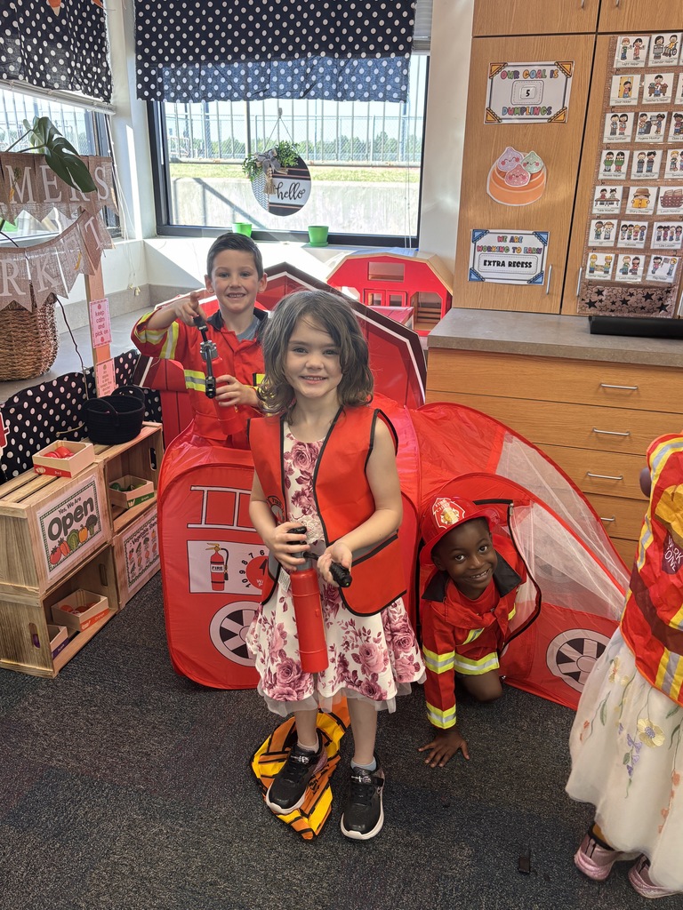 Kinder students dressed up as community helpers like firefighters, vets, and doctors. 