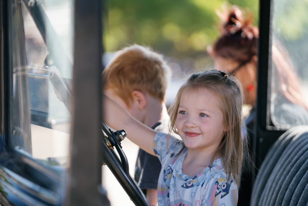 student pretend driving a truck