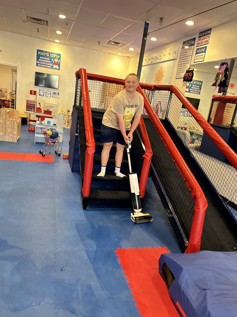 Intern vacuuming 