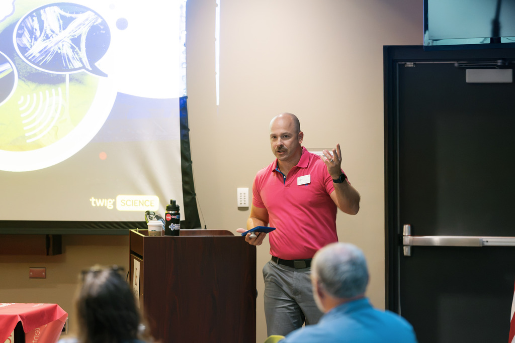 speaker at the front of the room