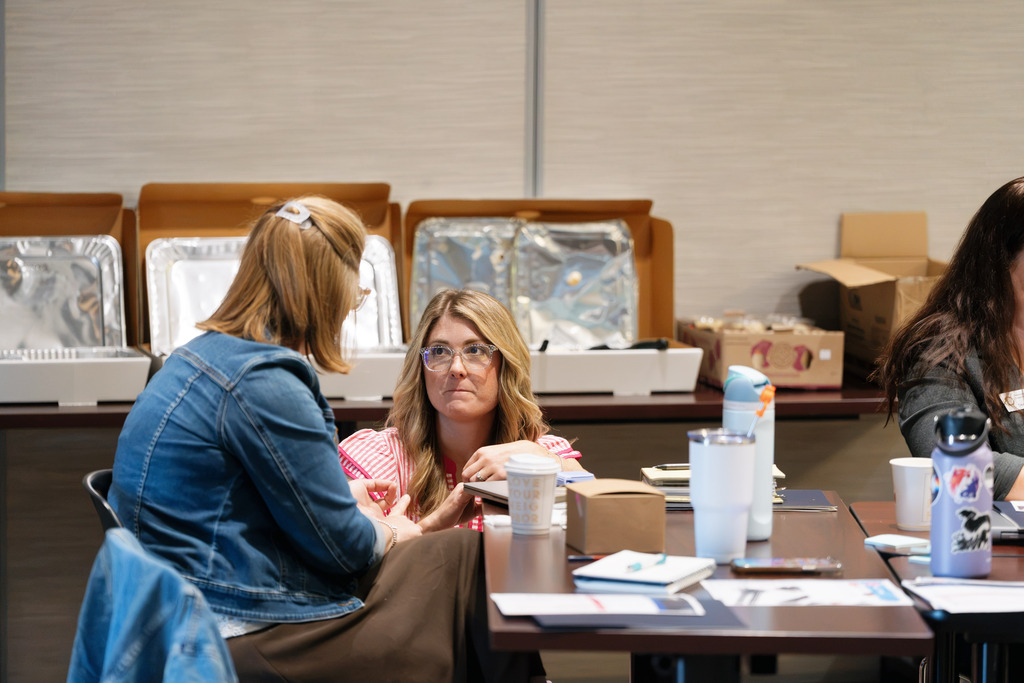 women talking to each other