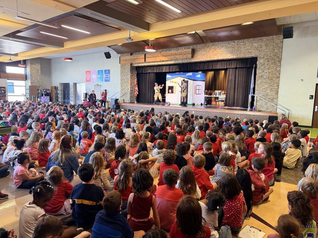 fire fighters sharing fire safety tips with the school