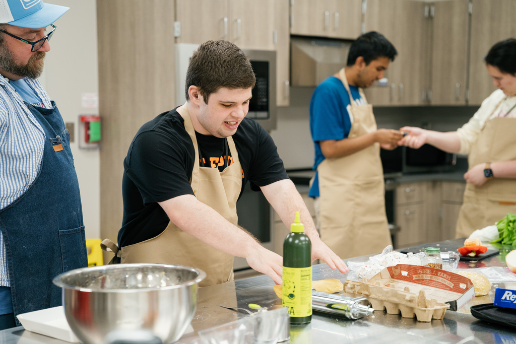 Student preparing dough for pasta
