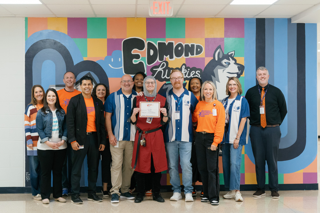 award winners standing with administrators