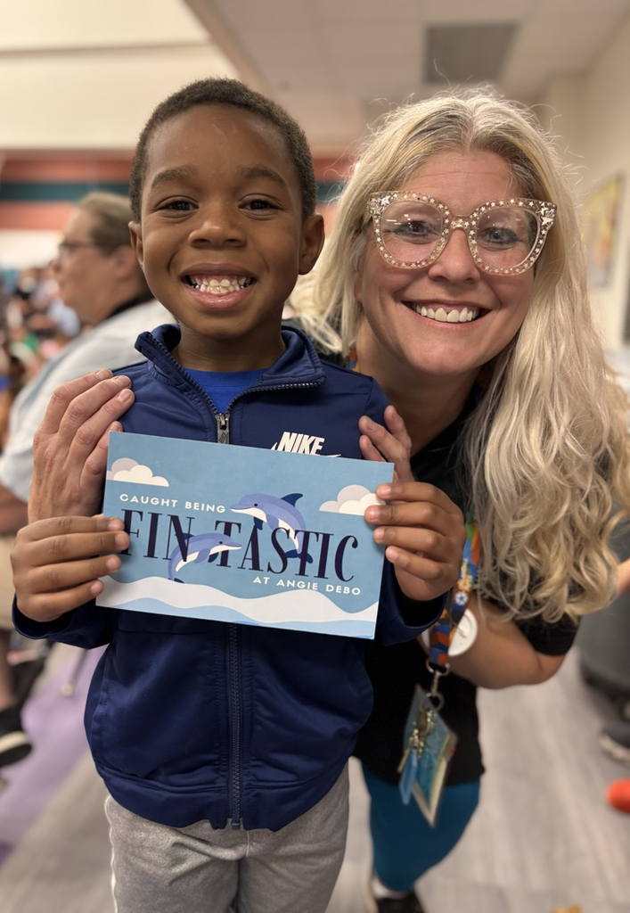 student with teacher and postcard 