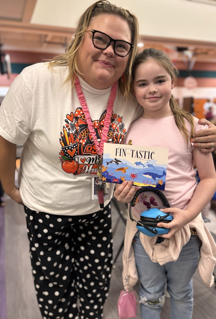 student and teacher with postcard 