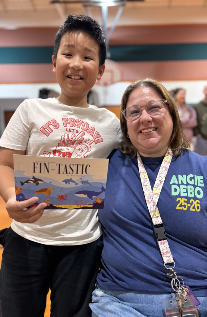 student and teacher with postcard 