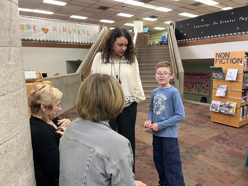 guests at the teacher of the year reception in media center