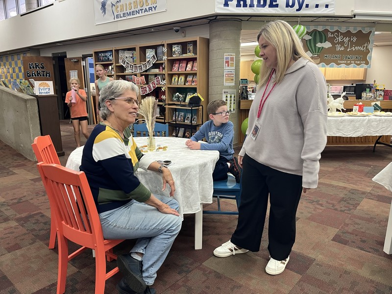 guests at the teacher of the year reception in media center