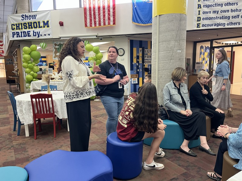 guests at the teacher of the year reception in media center