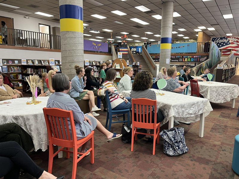 guests at the teacher of the year reception in media center