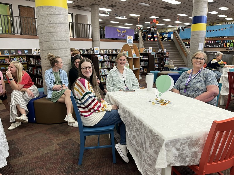 guests at the teacher of the year reception in media center