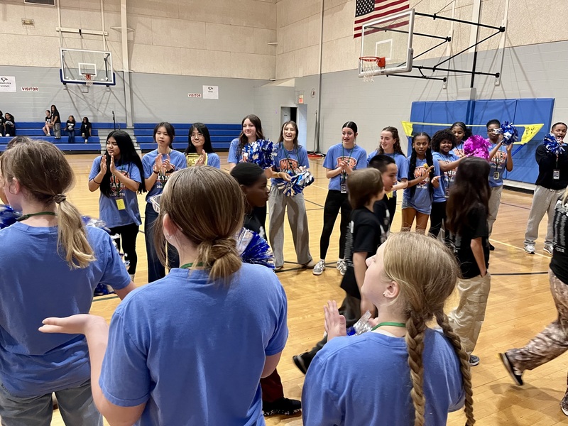WEB leaders cheer for 5th graders as they exit the gym and head back to their elementary schools.