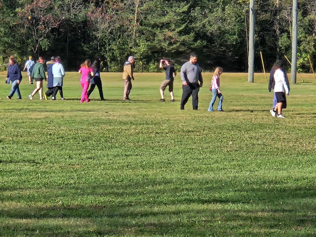 students playing in a field