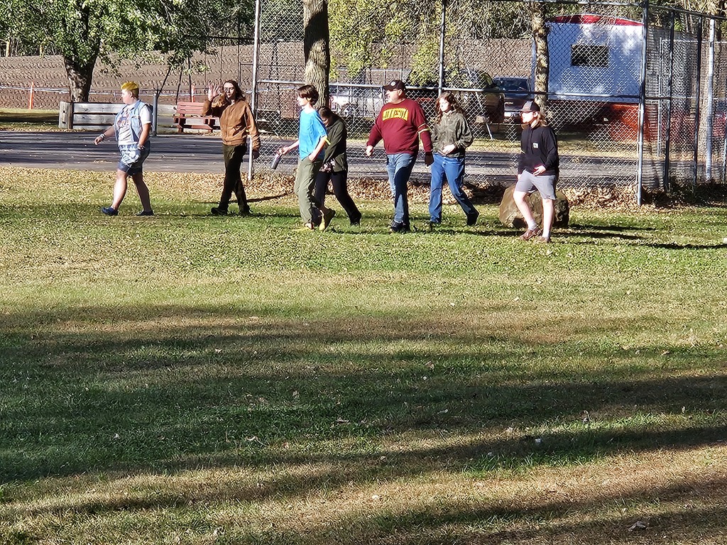students playing in a field